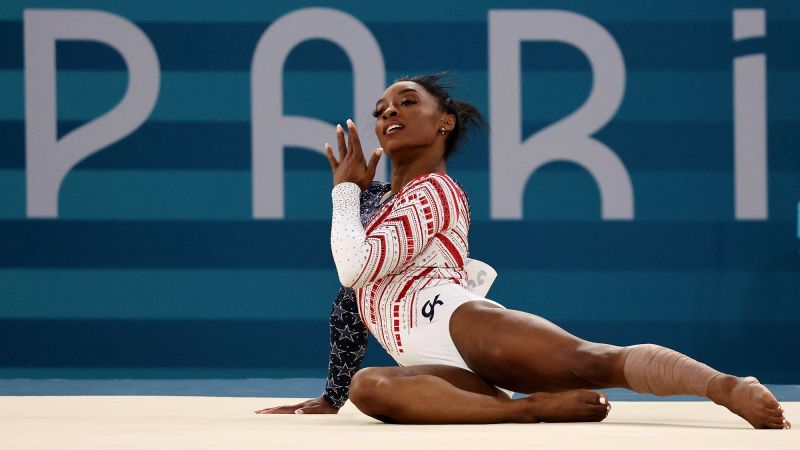 Simone Biles, alone on the floor, completes an incredible comeback