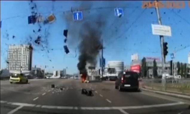 Motorist is inches from death when Russian missile comes down beside their car in Kyiv