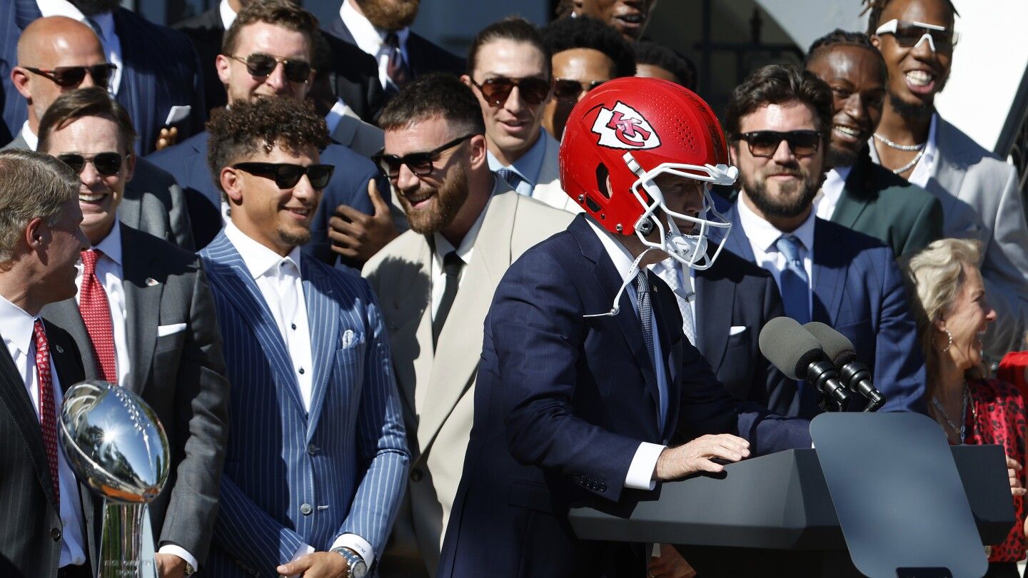 President Biden puts on Chiefs helmet during team's White House celebration